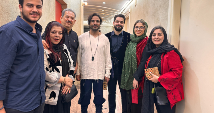 Aryan Rezaee playing the Daf as lead percussionist in the Pirouz and Parizad musical theatre at Vahdat Hall